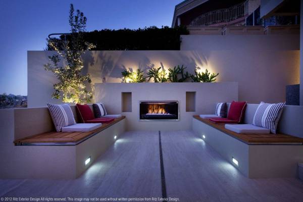 Fireplace and seating area. Credit: Ritz Exterior Design