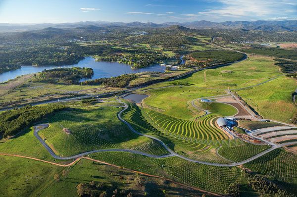 Large terraced earth sculptures form the major arrival sequence into the Arboretum. At the base, a carefully designed irrigation system directs water to the dam to redistribute back into the Arboretum. Photo credit: John Gollings 