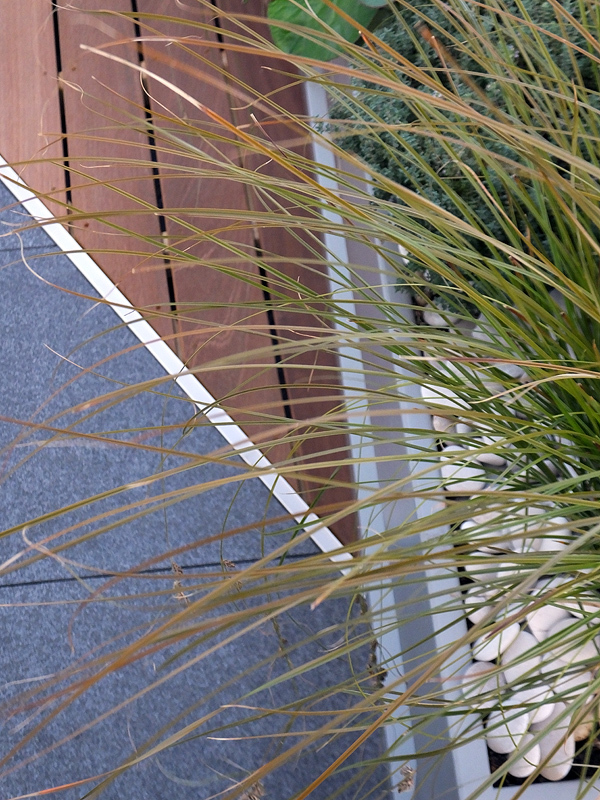 Planting and surface detail of a roof garden